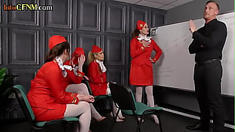 A Group Of Female Flight Attendants Engaged In Oral Pleasure For A Man In A Dominant Femdom Setting